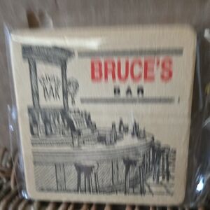 Vtg Bruce's Bar Coaster with Red and Black Design